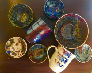 Eco, Love & Other Stuff - Australian, Handmade, One of a kind Ceramic Cup, Mug, Small and medium Bowls. Colours blue and red "crayfish", Black "croc" , Dark Blue, Light Blue and White "celadon". Made on Magnetic Island, High quality Stoneware, Fired at 1280 degrees. 